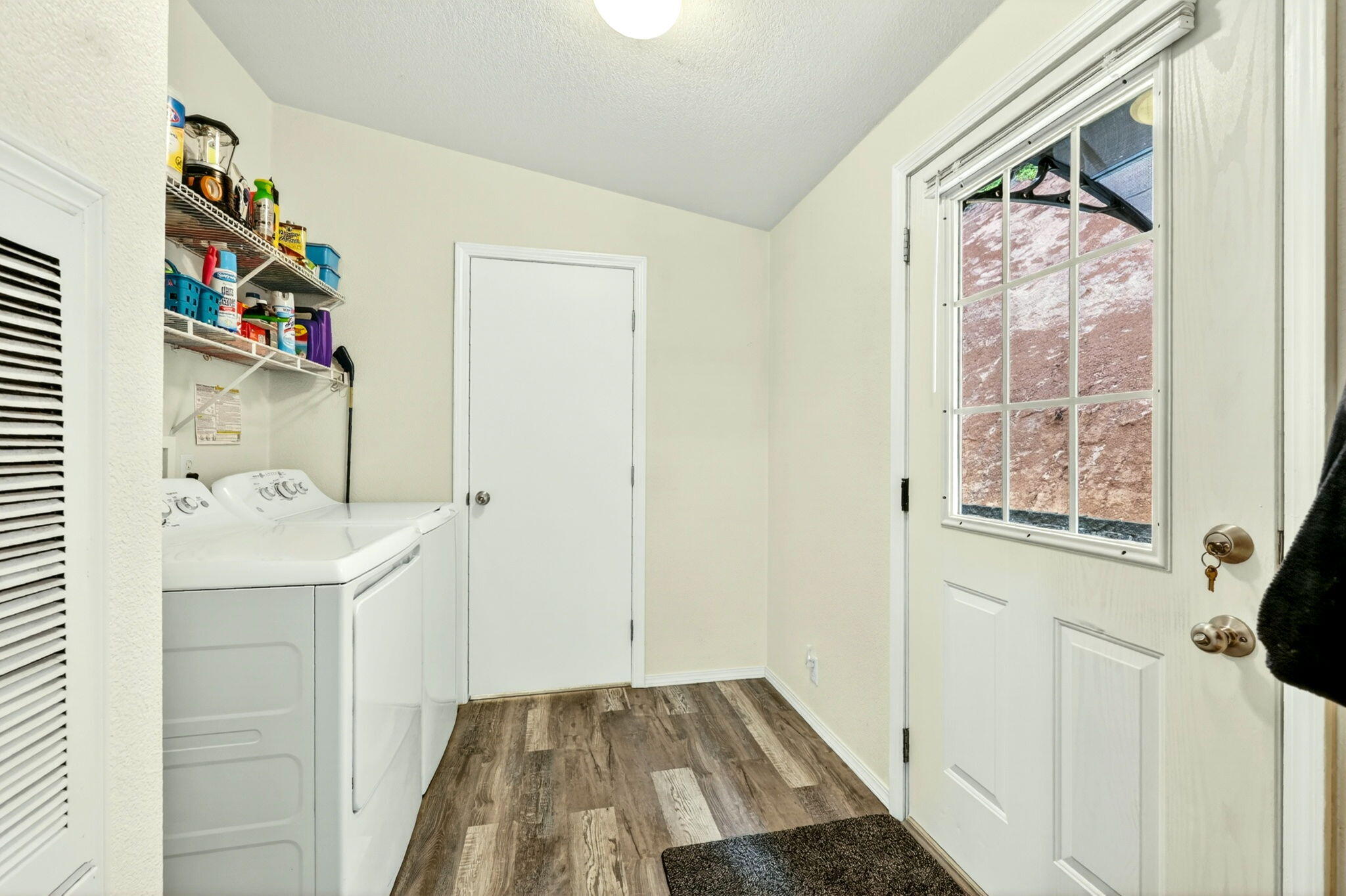 5445 Thompson Creek Road Selma, OR 97538 - Photo 32 of 57 a bathroom with a sink a toilet and a shower curtain