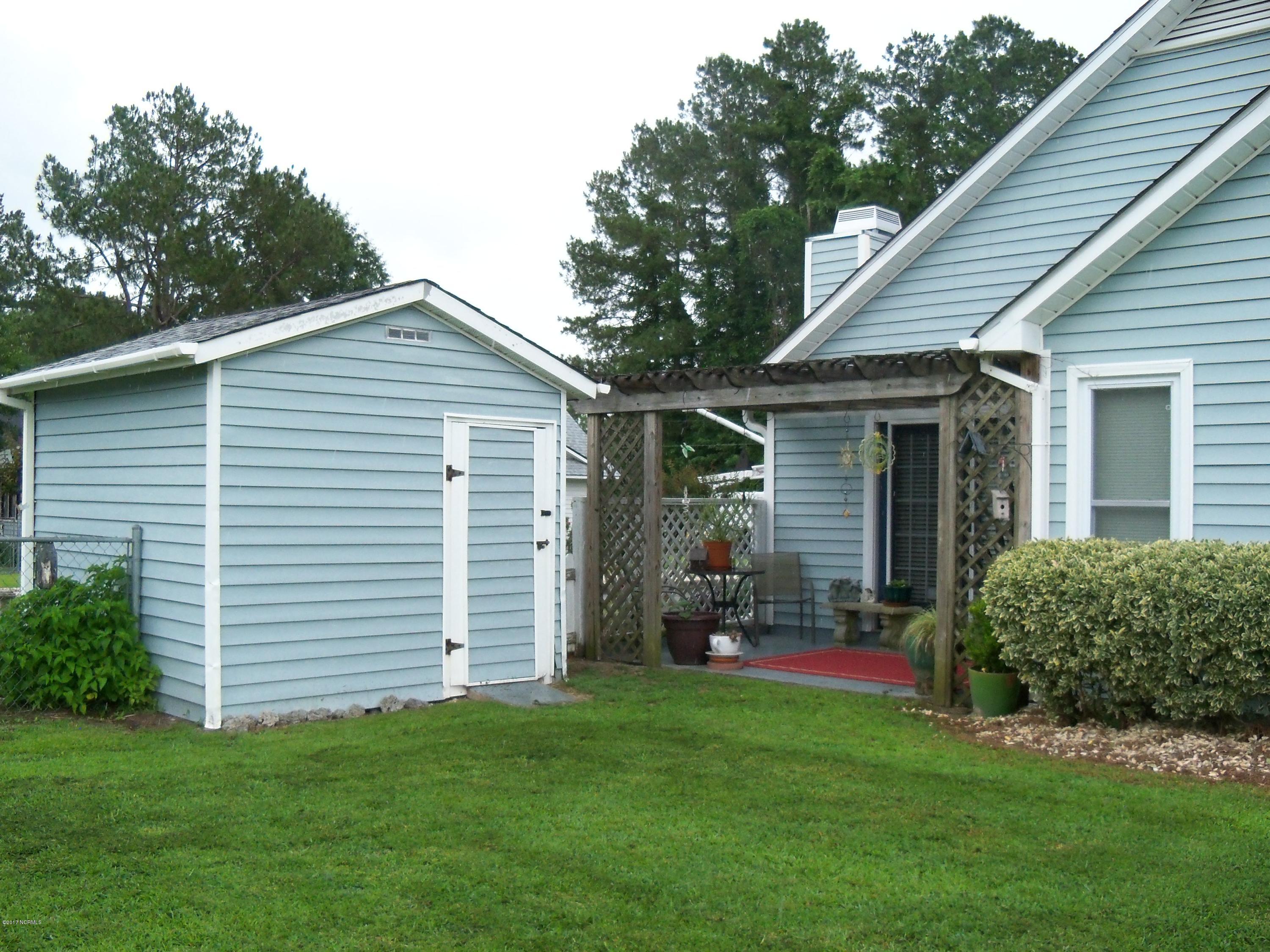 126 Pirates Road New Bern, NC 28562 - Photo 6 of 24 Back yard with storage shed
