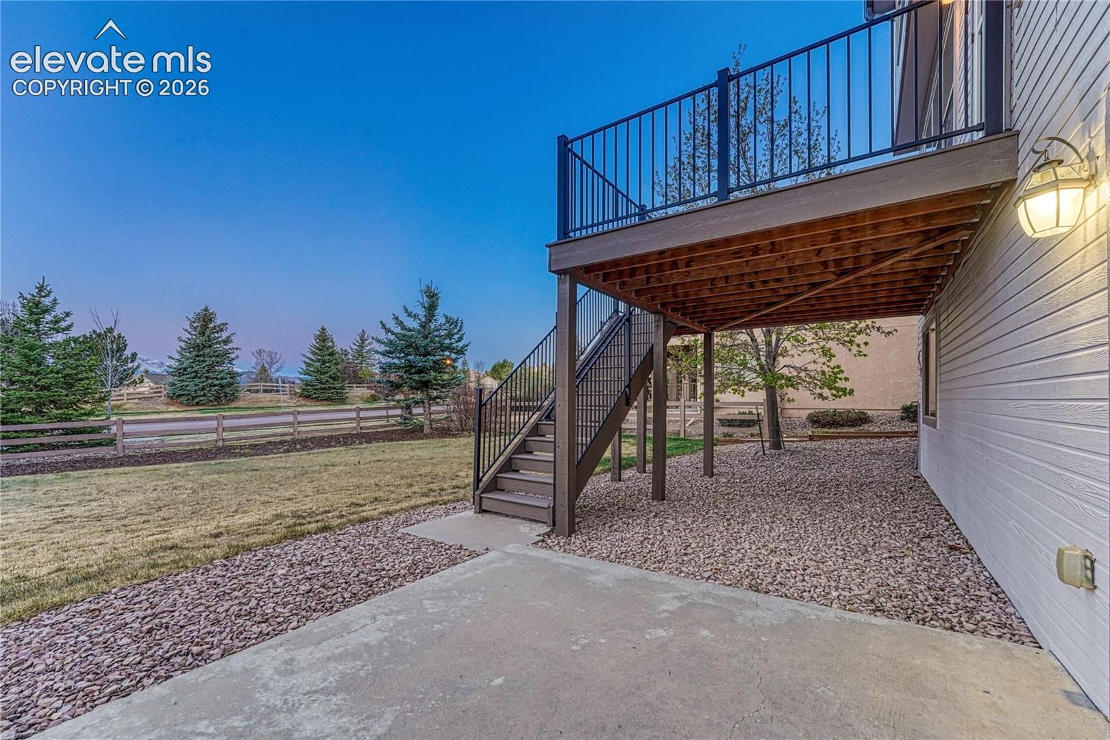 2413 Cinnabar Road Colorado Springs, CO 80921 - Photo 8 of 50 Walkout to this amazing space with views of Barefoot Park
