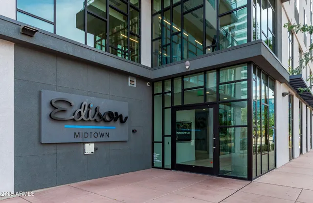 a front view of a house with a garage