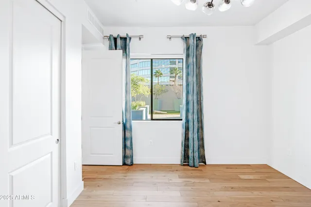 a view of entryway with wooden floor