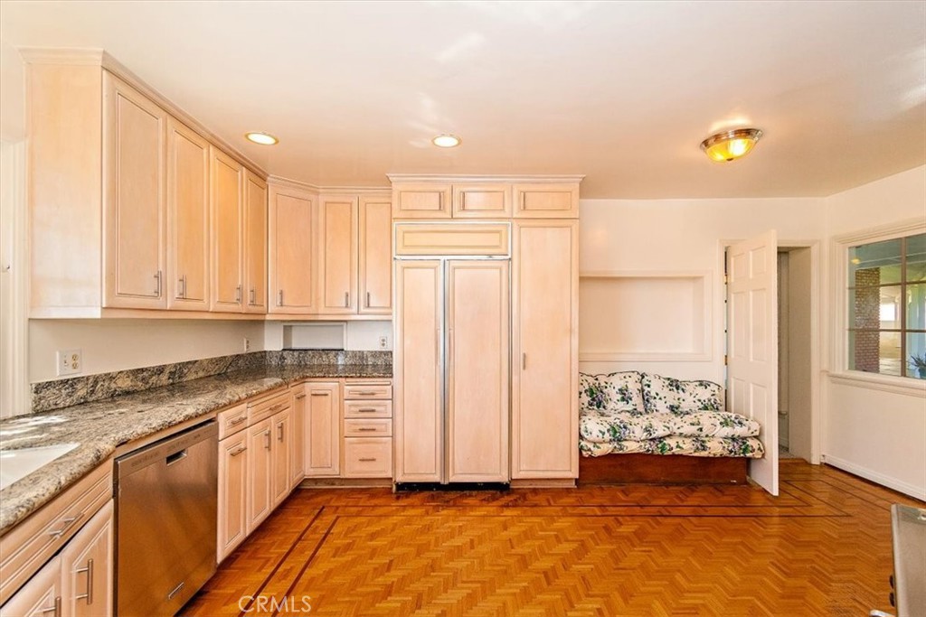 2 Quail Ridge Road South Rolling Hills, CA 90274 - Photo 22 of 67 a kitchen with granite countertop white cabinets and appliances