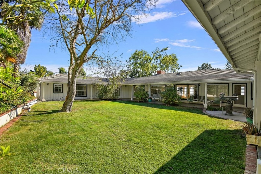 2 Quail Ridge Road South Rolling Hills, CA 90274 - Photo 3 of 67 a front view of a house with garden