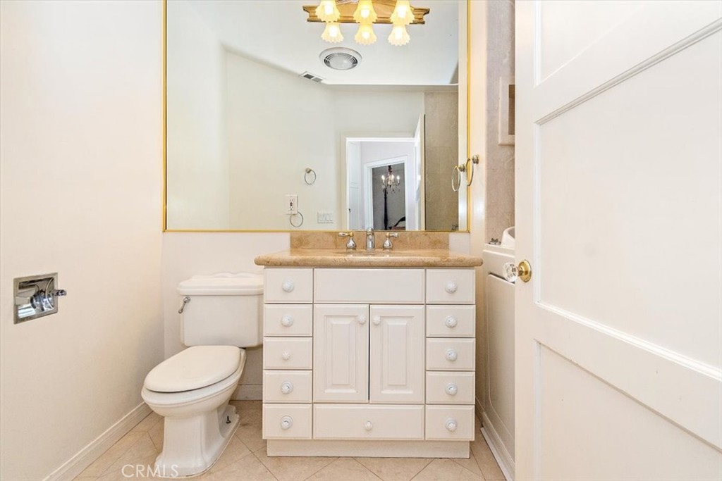 2 Quail Ridge Road South Rolling Hills, CA 90274 - Photo 34 of 67 a bathroom with a sink a toilet and a mirror