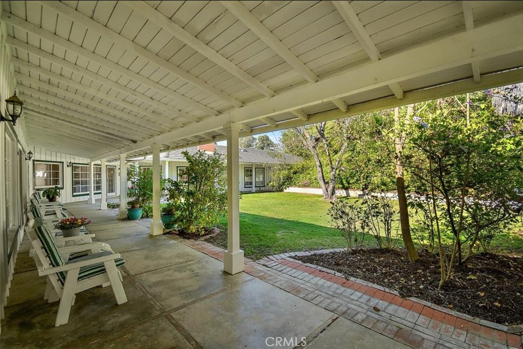 2 Quail Ridge Road South Rolling Hills, CA 90274 - Photo 49 of 67 a patio with yard table and chairs
