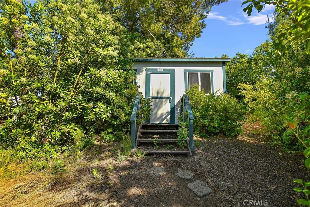 2 Quail Ridge Road South Rolling Hills, CA 90274 - Photo 51 of 67 a view of a house with a yard and sitting area