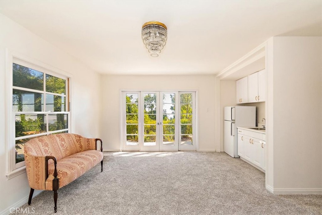 2 Quail Ridge Road South Rolling Hills, CA 90274 - Photo 60 of 67 a living room with furniture and a large window