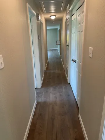 a bathroom with a toilet a sink and bathtub