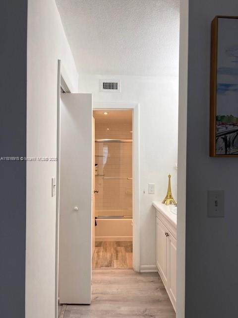 677 Southwest 9th Avenue, Unit 303 Miami, FL 33130 - Photo 23 of 34 a bathroom with a sink and a mirror