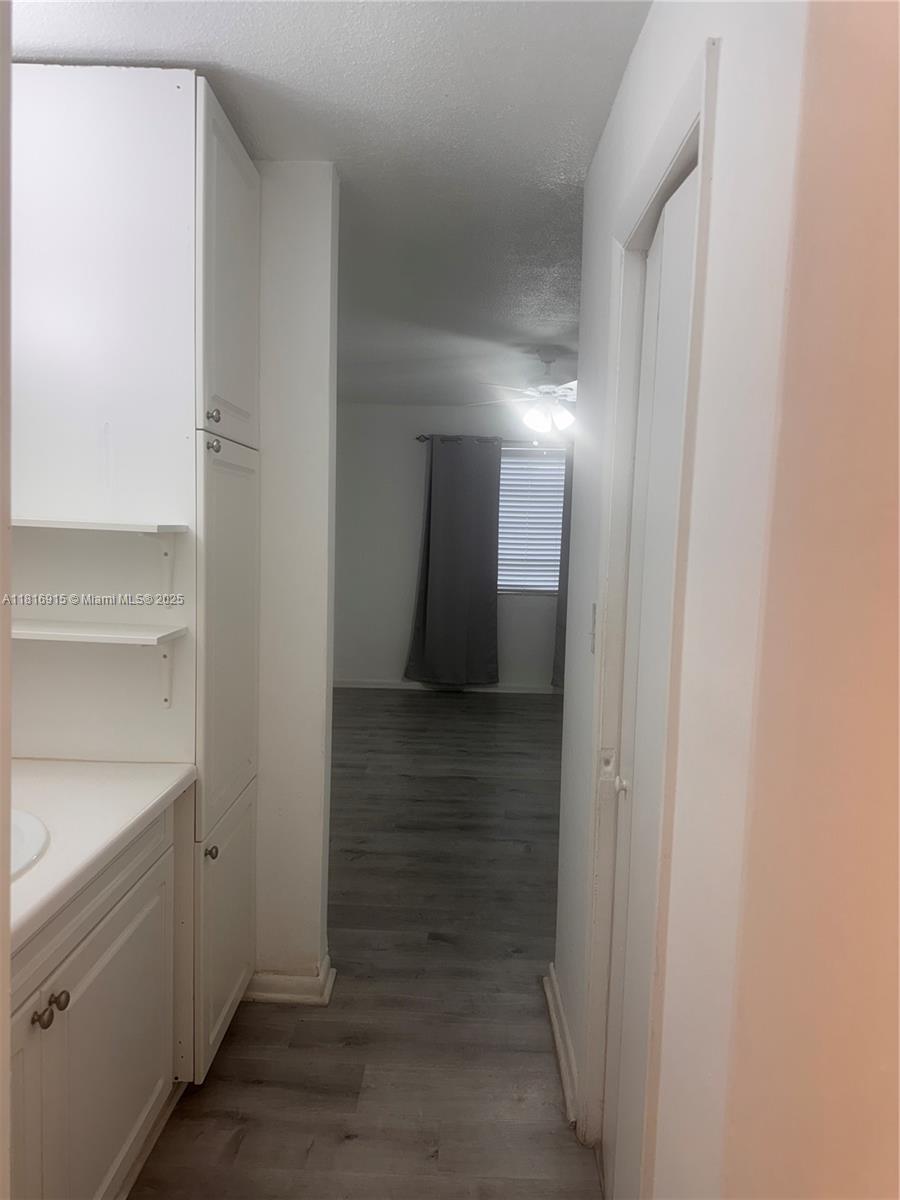 677 Southwest 9th Avenue, Unit 303 Miami, FL 33130 - Photo 8 of 34 a bathroom with a sink and a mirror