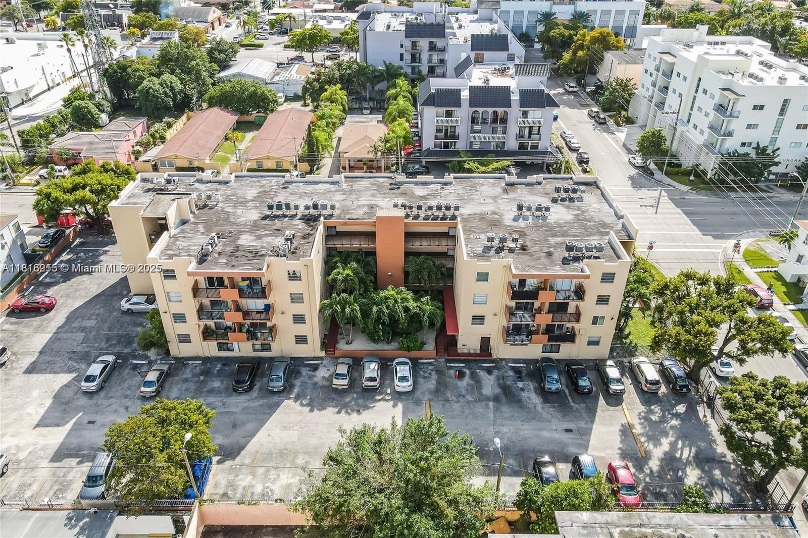 677 Southwest 9th Avenue, Unit 303 Miami, FL 33130 - Photo 9 of 34 a view of building with an outdoor space