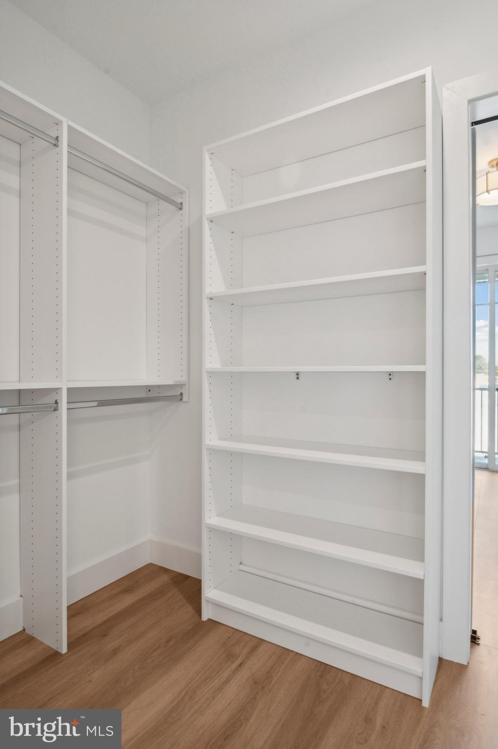 35 Chestnut Road, Unit 204 Paoli, PA 19301 - Photo 6 of 13 a view of walk in closet with empty racks