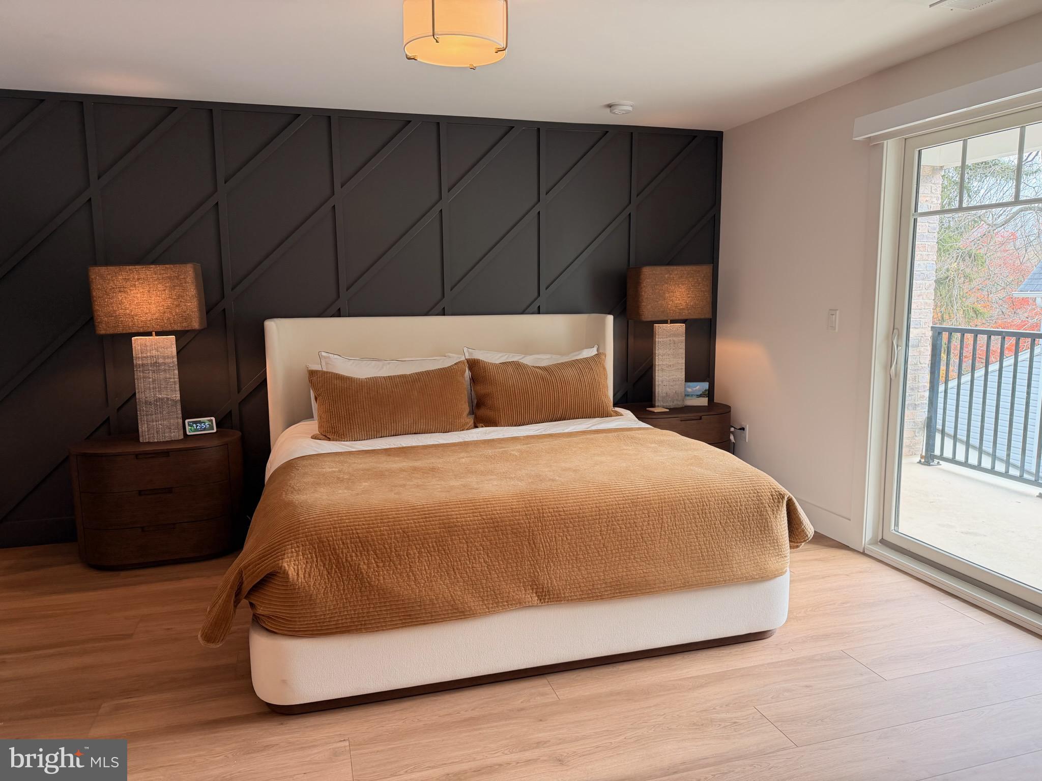 35 Chestnut Road, Unit 204 Paoli, PA 19301 - Photo 8 of 13 a bedroom with a bed and window