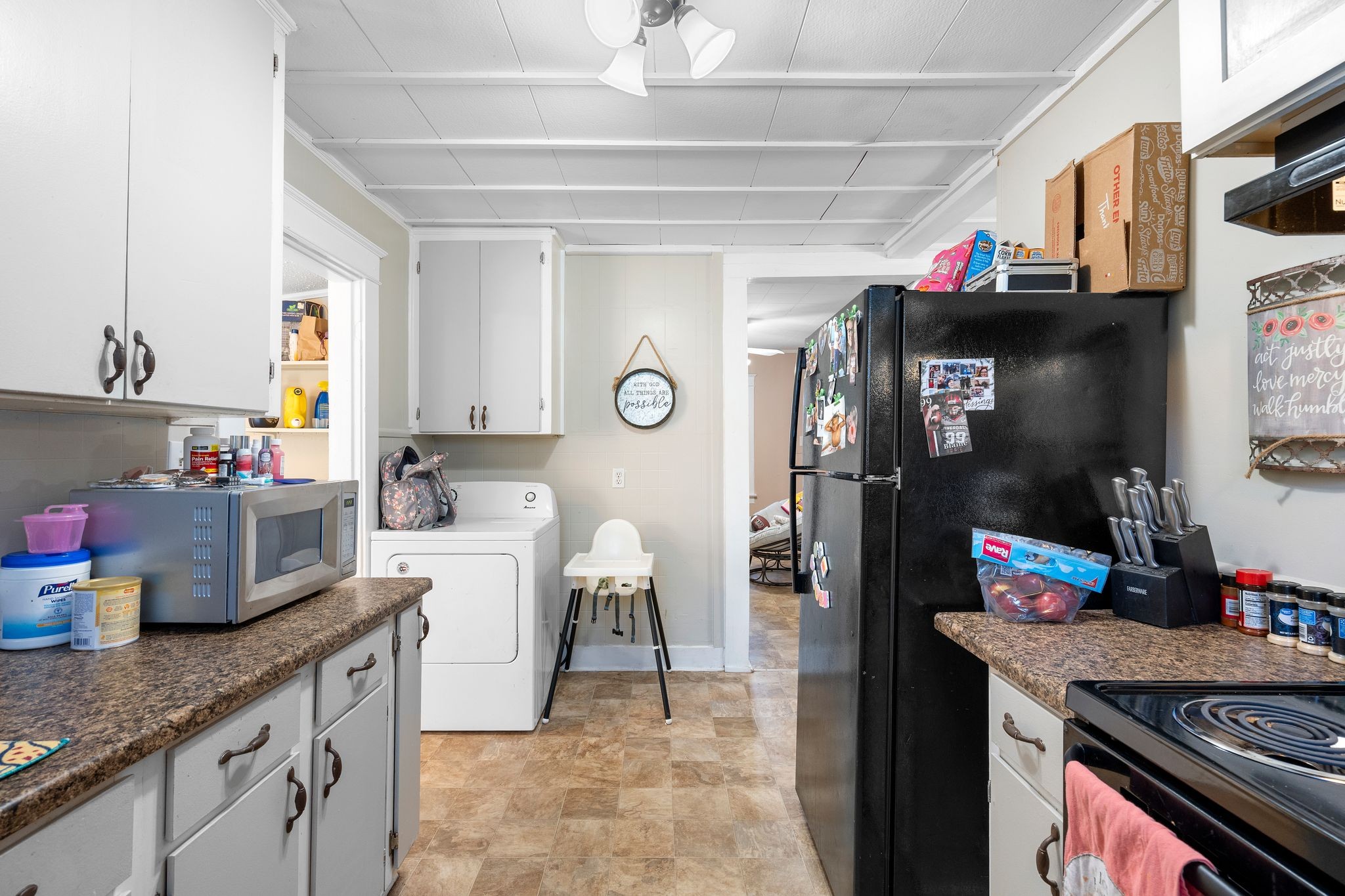 1710 County Hospital Road Nashville, TN 37218 - Photo 12 of 27 a kitchen with granite countertop a refrigerator stove and sink