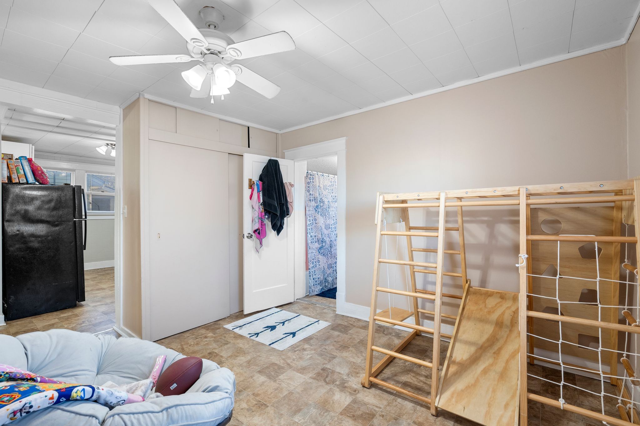 1710 County Hospital Road Nashville, TN 37218 - Photo 15 of 27 a bedroom with a bed and a couch