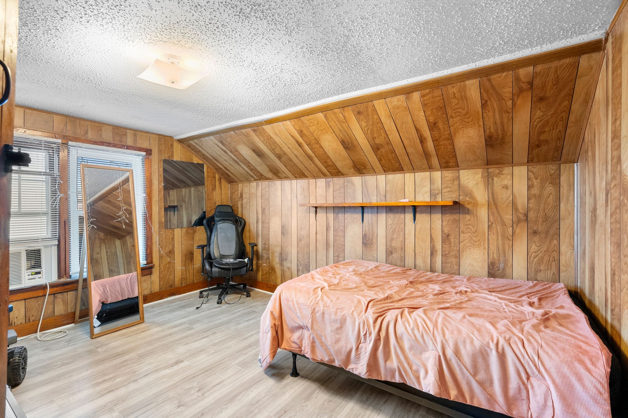 1710 County Hospital Road Nashville, TN 37218 - Photo 18 of 27 a bedroom with a bed and wooden floor