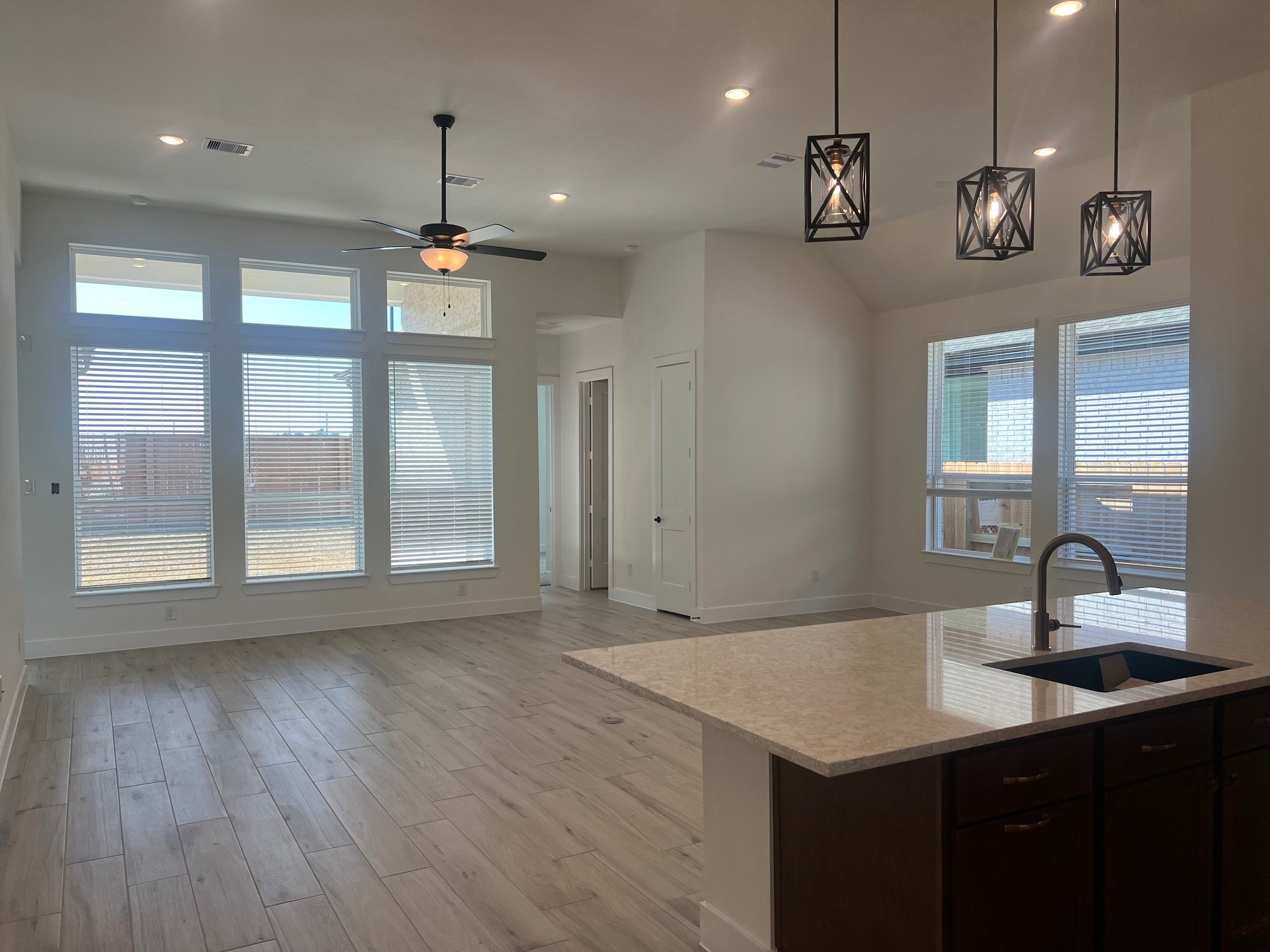 13331 Valley Orchard Tomball, TX 77375 - Photo 6 of 30 a bathroom with a sink a large window and a chandelier