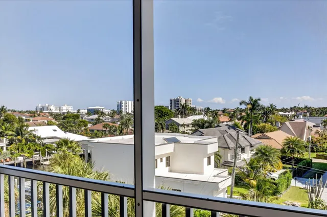 a view of a lake from a balcony