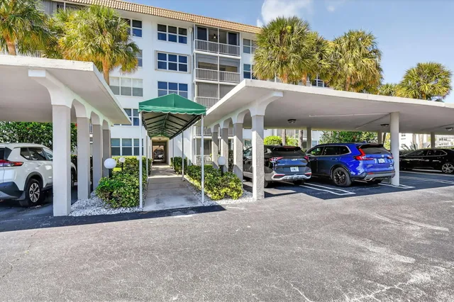 a view of a cars parked in front of a building