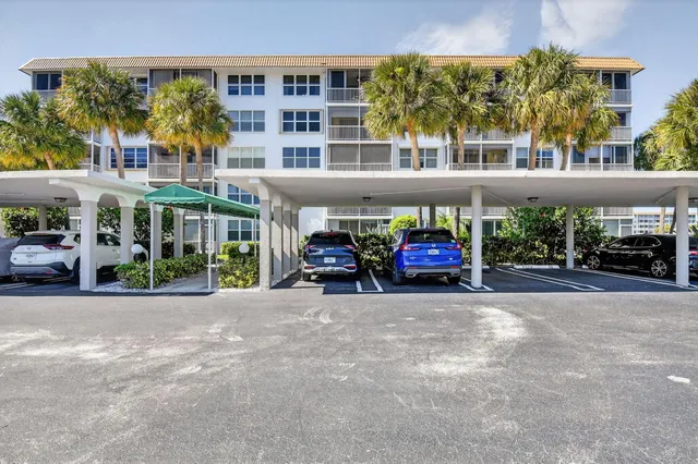a view of a car parked in front of a building