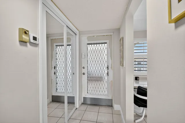 a view of front door with stairs