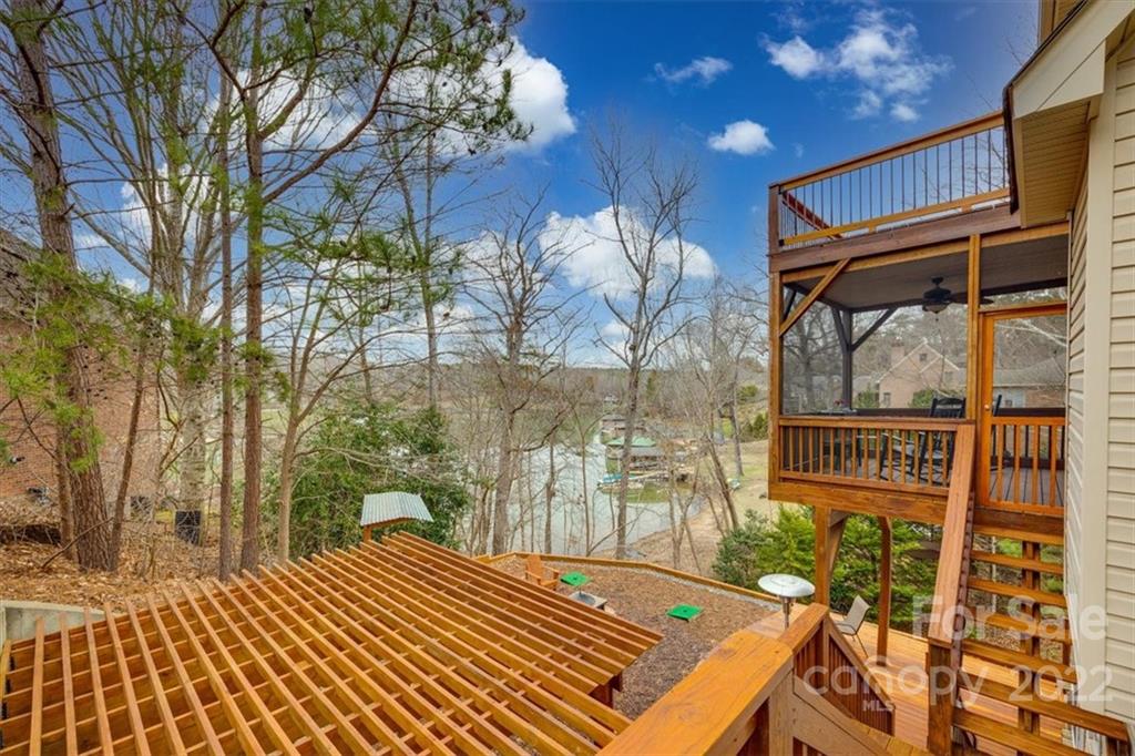 11145 Scullers Run Tega Cay, SC 29708 - Photo 43 of 48 a view of a patio with a table and chairs