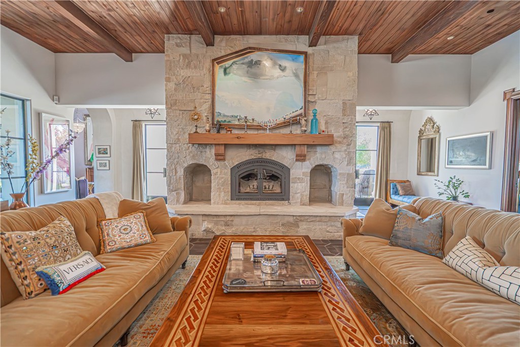3030 Templeton Road Templeton, CA 93465 - Photo 14 of 75 A stone wood-burning fireplace crafted from genuine limestone, featuring visible fossils that make it a stunning work of art all on its own.