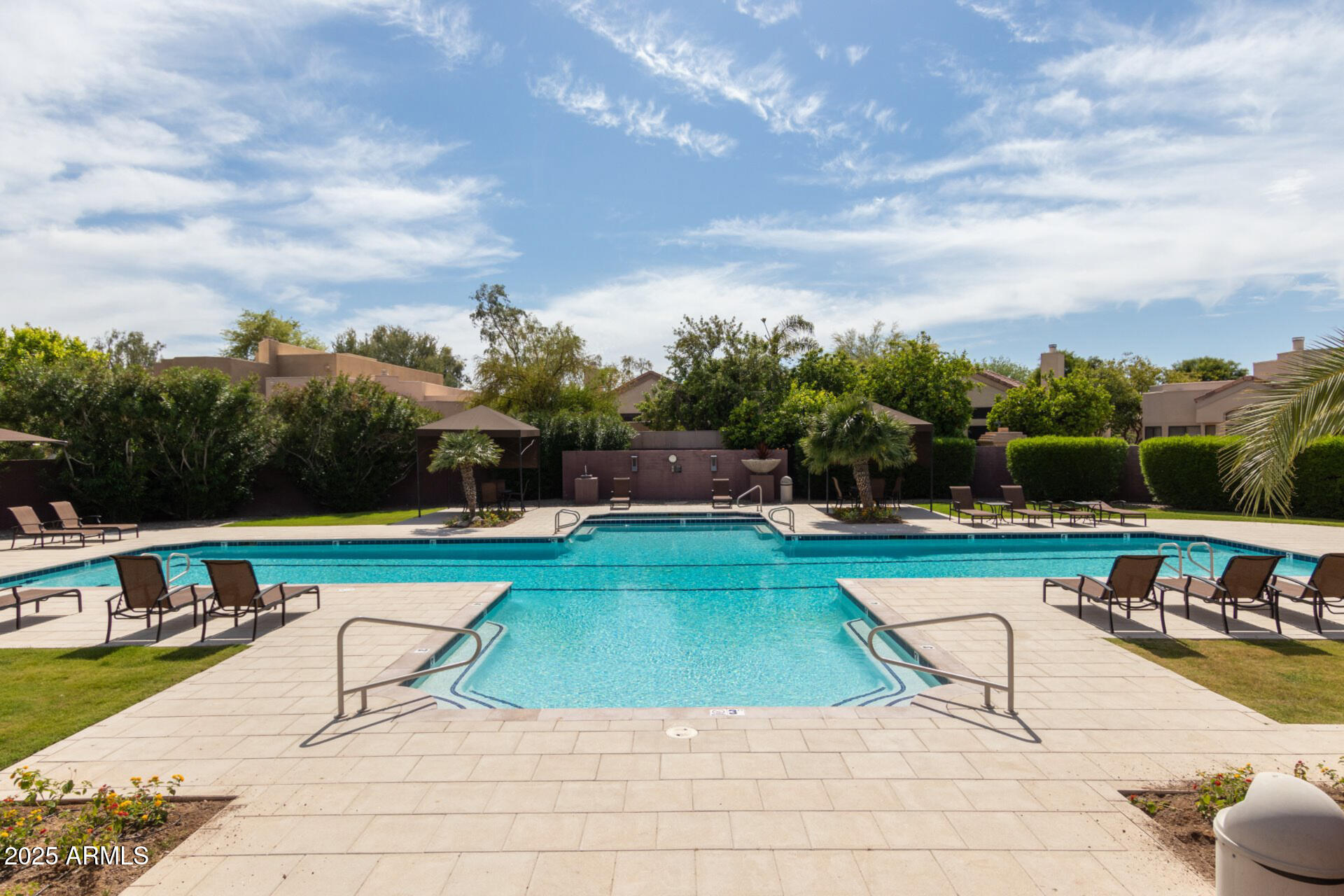 7700 East Gainey Ranch Road, Unit 102 Scottsdale, AZ 85258 - Photo 30 of 40 a view of swimming pool with seating area and furniture