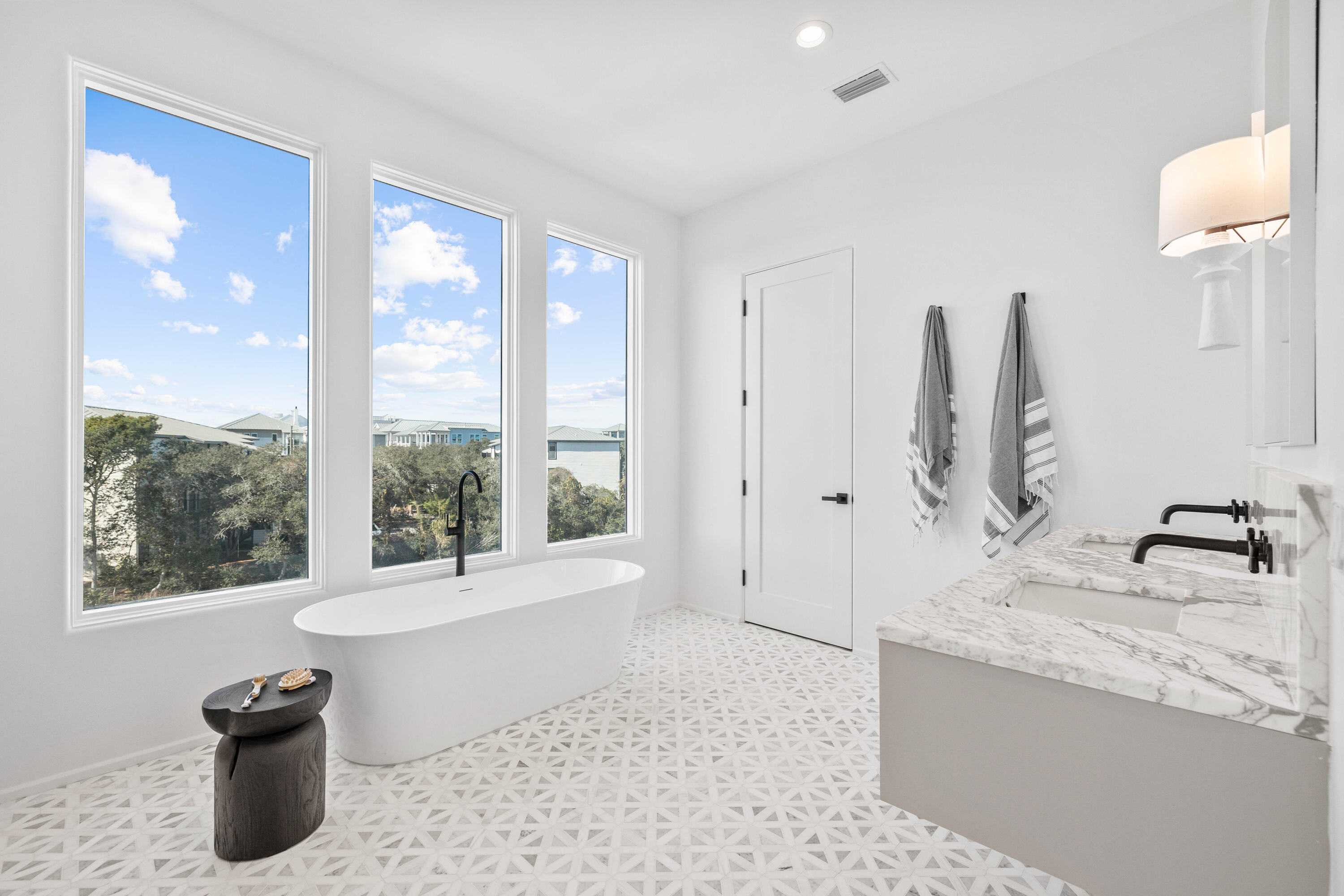 244 West Park Pl Avenue Inlet Beach, FL 32461 - Photo 17 of 49 a spacious bathroom with a tub sink and mirror