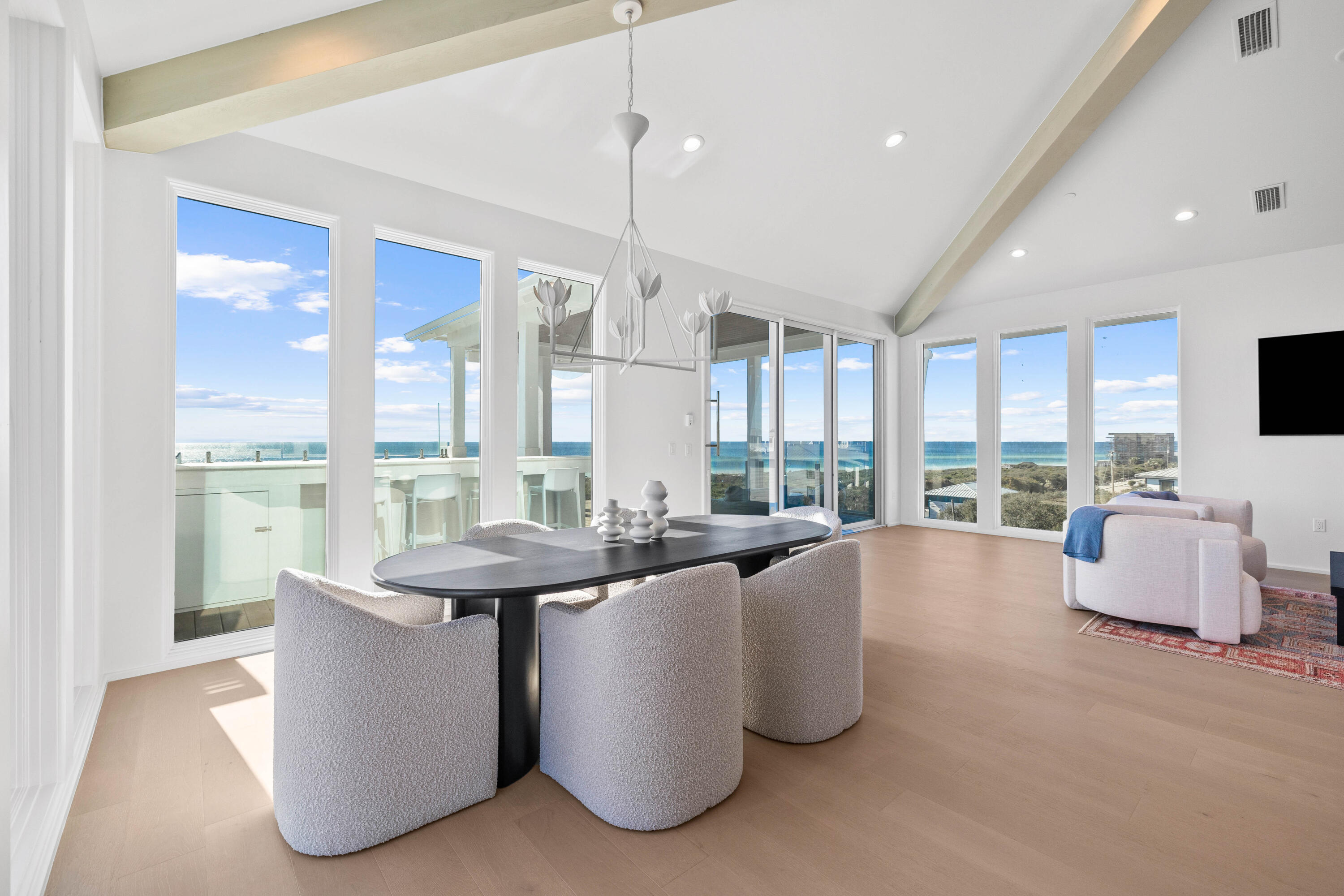 244 West Park Pl Avenue Inlet Beach, FL 32461 - Photo 19 of 49 a living room with kitchen island furniture and a large window