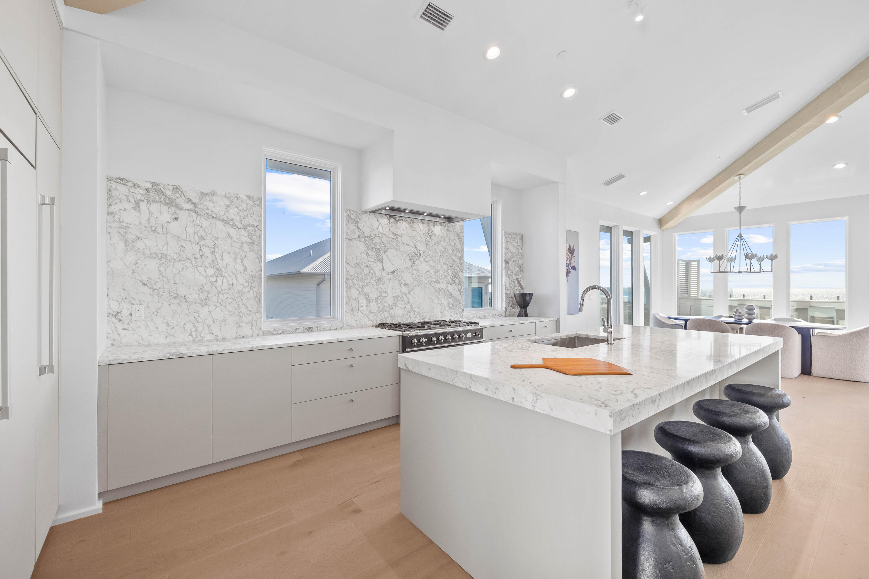 244 West Park Pl Avenue Inlet Beach, FL 32461 - Photo 35 of 49 a kitchen with stainless steel appliances granite countertop a sink stove and refrigerator