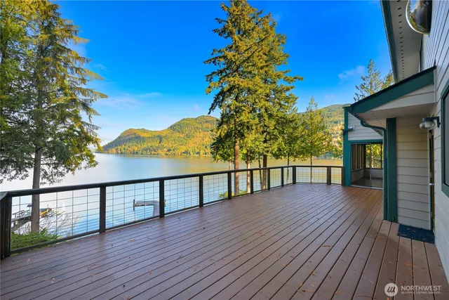 a view of a balcony with wooden floor