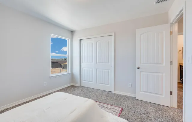 a view of an empty room and window