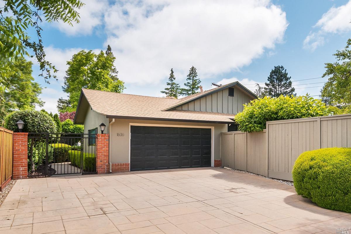 a front view of a house with a garage