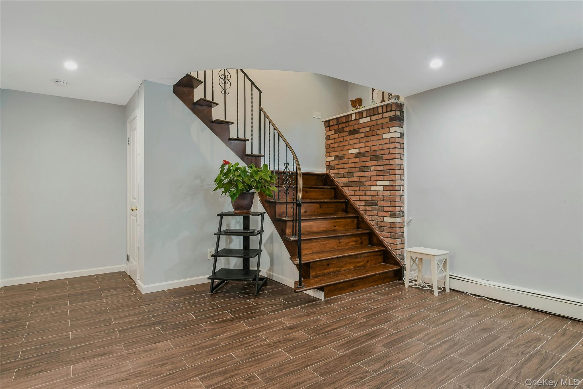 27 Upper Sheep Pasture Road East Setauket, NY 11733 - Photo 3 of 25 a view of entryway with wooden floor