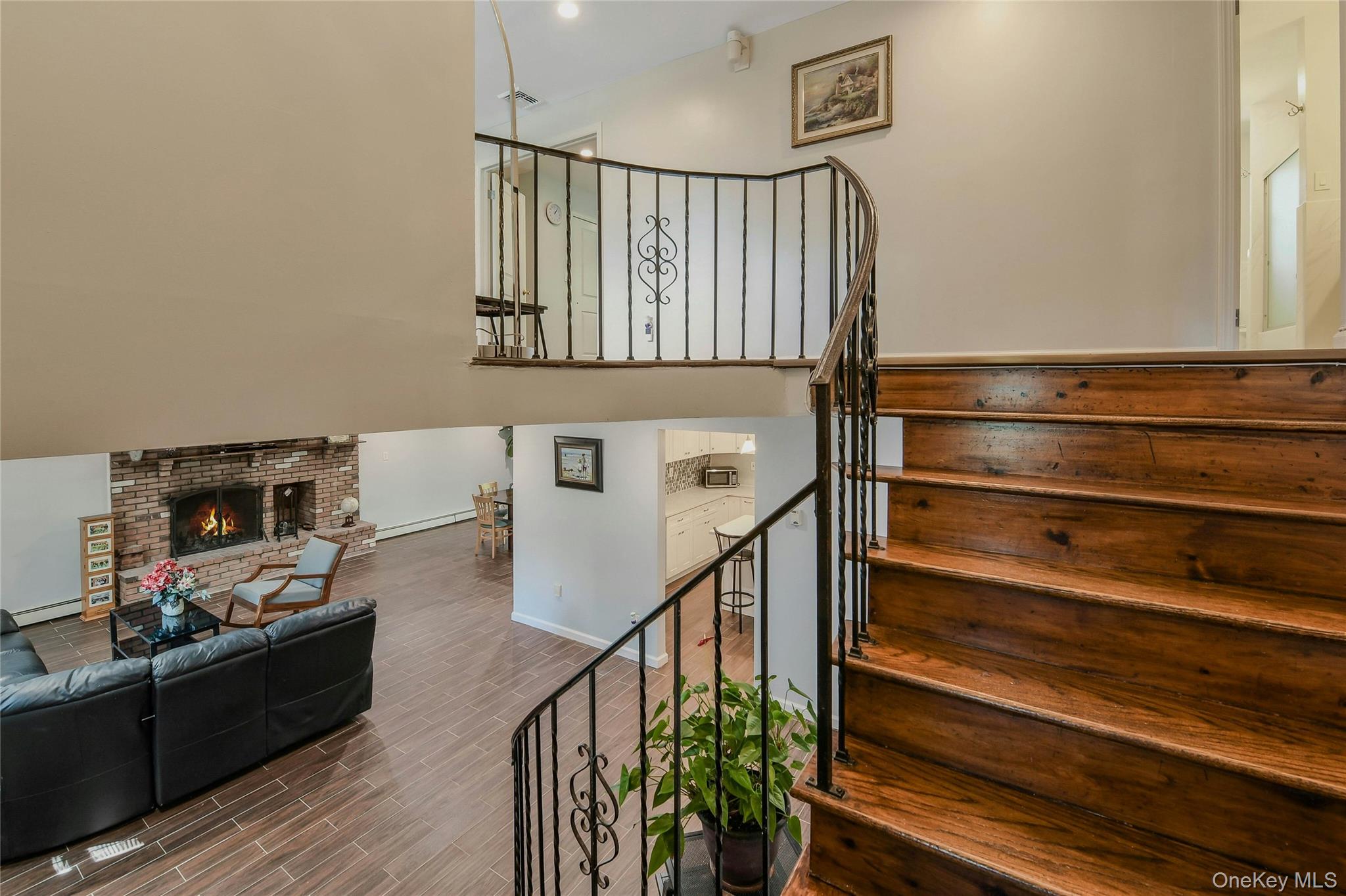 27 Upper Sheep Pasture Road East Setauket, NY 11733 - Photo 10 of 25 a view of entryway and hall with wooden floor
