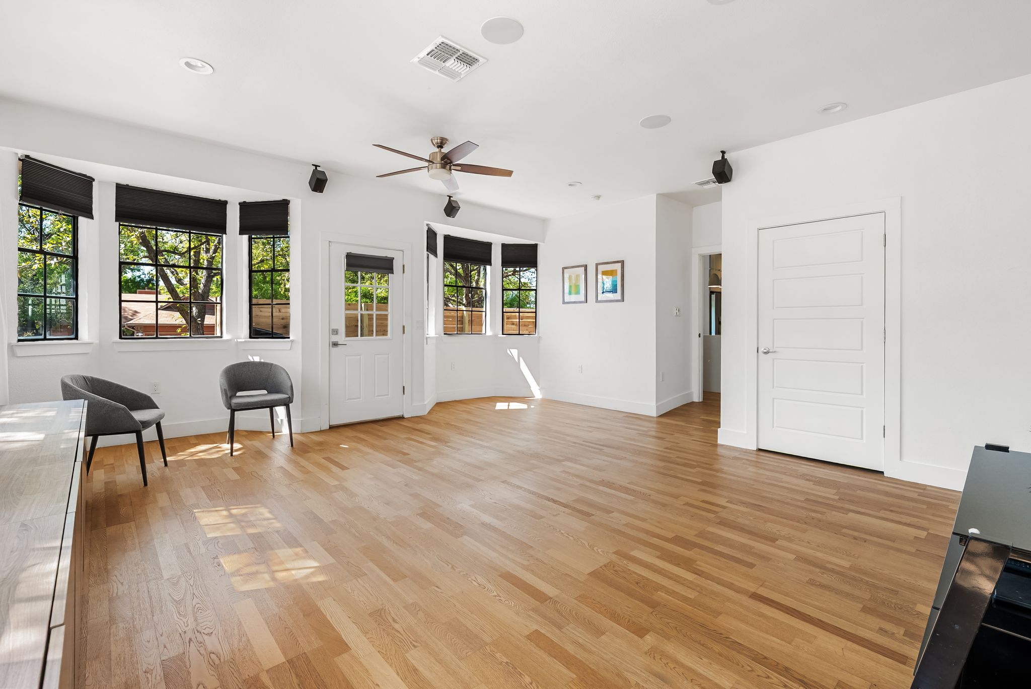 1714 Prairie Hen Cove Austin, TX 78758 - Photo 14 of 35 a view of a livingroom with furniture window and wooden floor