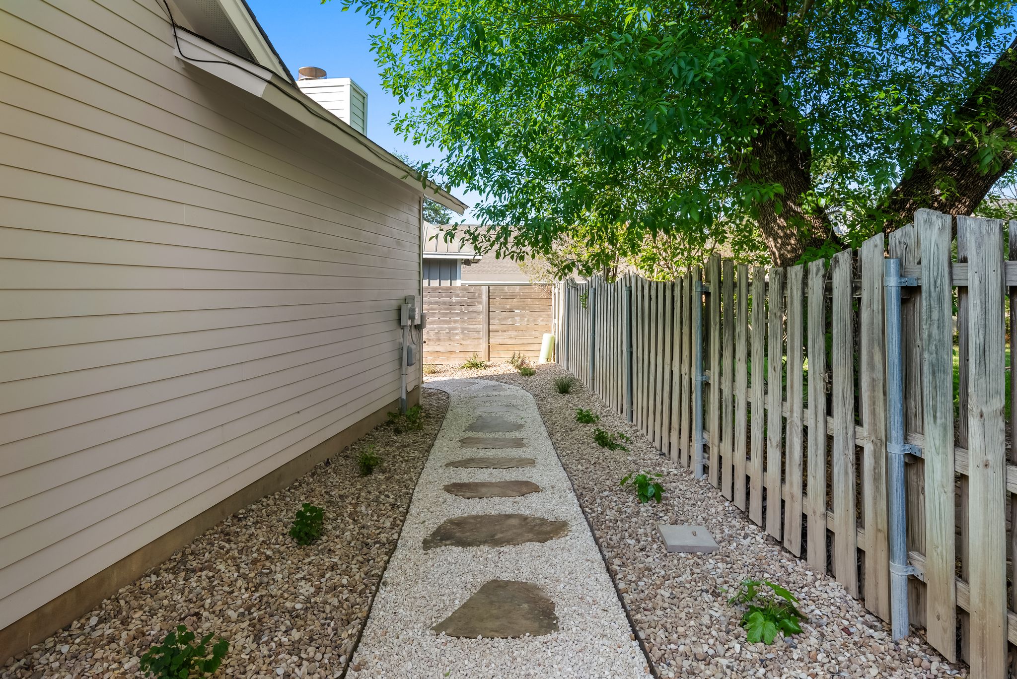 1714 Prairie Hen Cove Austin, TX 78758 - Photo 17 of 35 a view of a pathway with a house