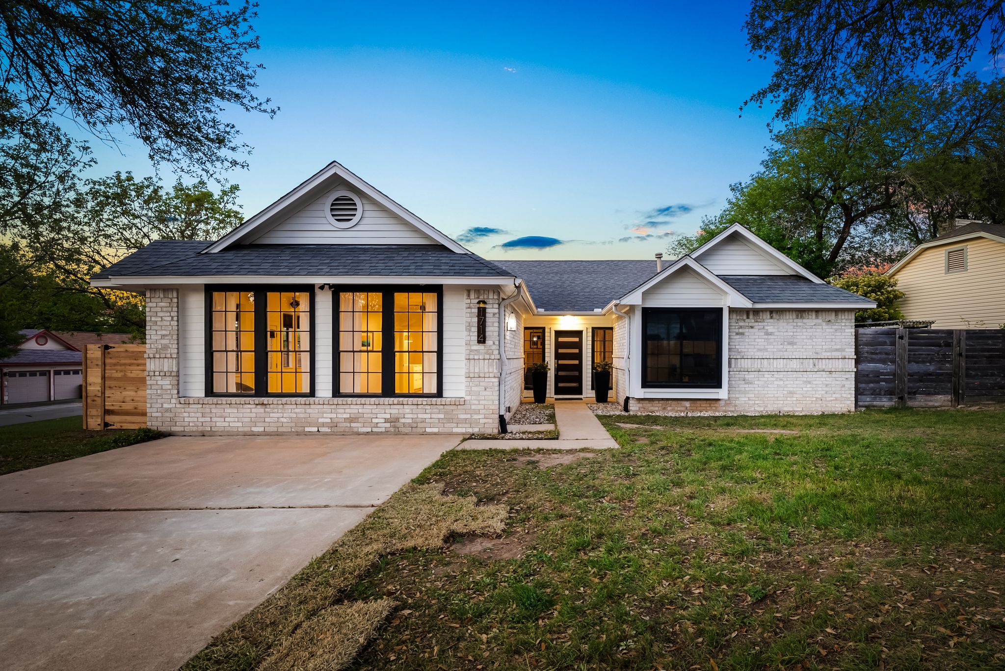 1714 Prairie Hen Cove Austin, TX 78758 - Photo 3 of 35 a front view of a house with yard
