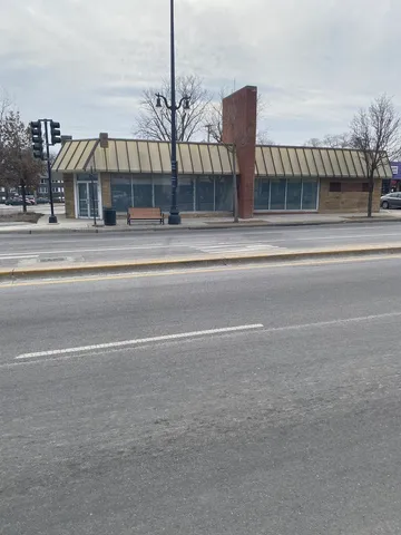 a view of a building and a street