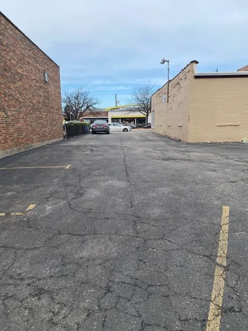 an empty room with a fireplace