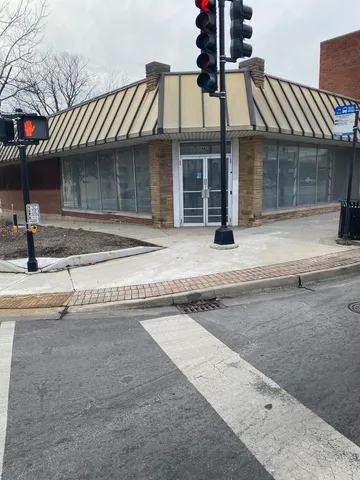 a view of large parking space and a street view