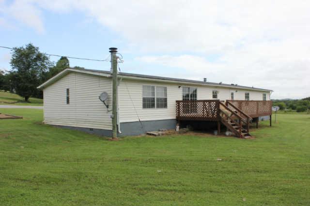 7290 Delina Road Petersburg, TN 37144 - Photo 14 of 19 Back of home with large deck, and HUGE yard!