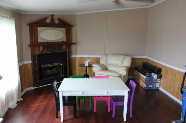 7290 Delina Road Petersburg, TN 37144 - Photo 3 of 19 Den with new flooring and gas log fireplace