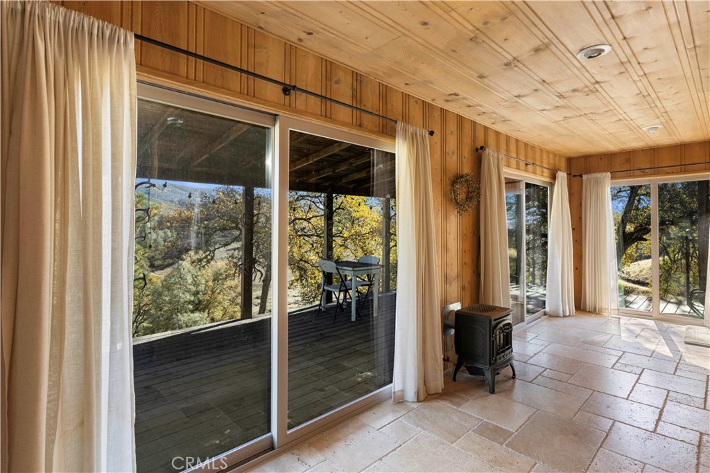 5200 Bartlett Springs Road Upper Lake, CA 95485 - Photo 14 of 36 a view of a porch with a door and a porch