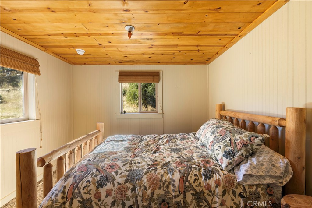 5200 Bartlett Springs Road Upper Lake, CA 95485 - Photo 16 of 36 a bedroom with a bed and a window