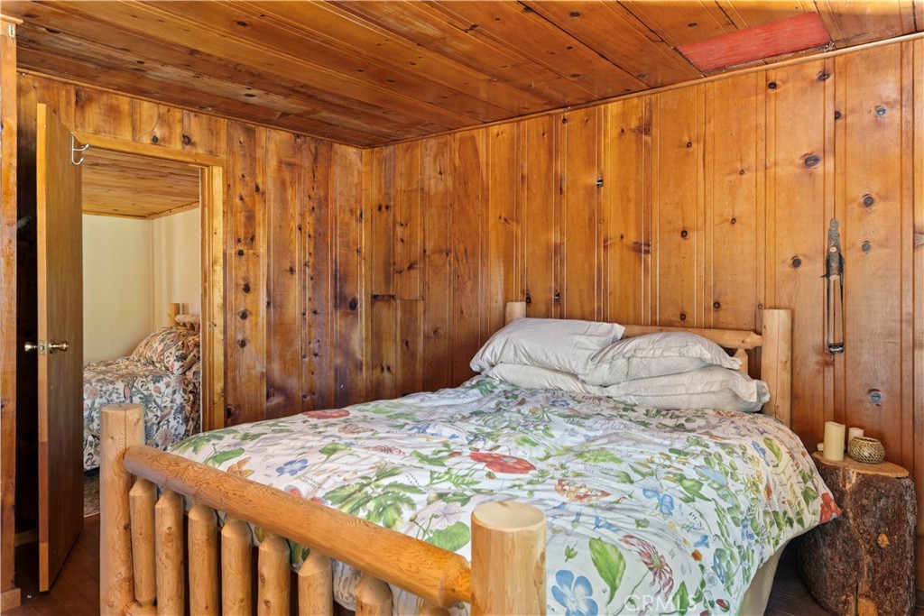 5200 Bartlett Springs Road Upper Lake, CA 95485 - Photo 17 of 36 a bedroom with a bed and a curtain