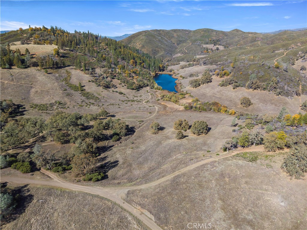 5200 Bartlett Springs Road Upper Lake, CA 95485 - Photo 35 of 36 a view of a dry field with mountains in the background