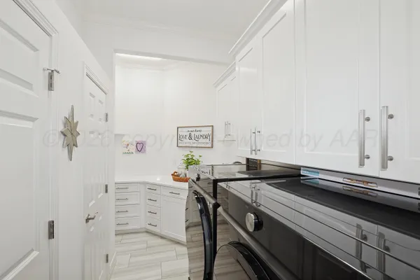 a view of living room with furniture and wooden floor