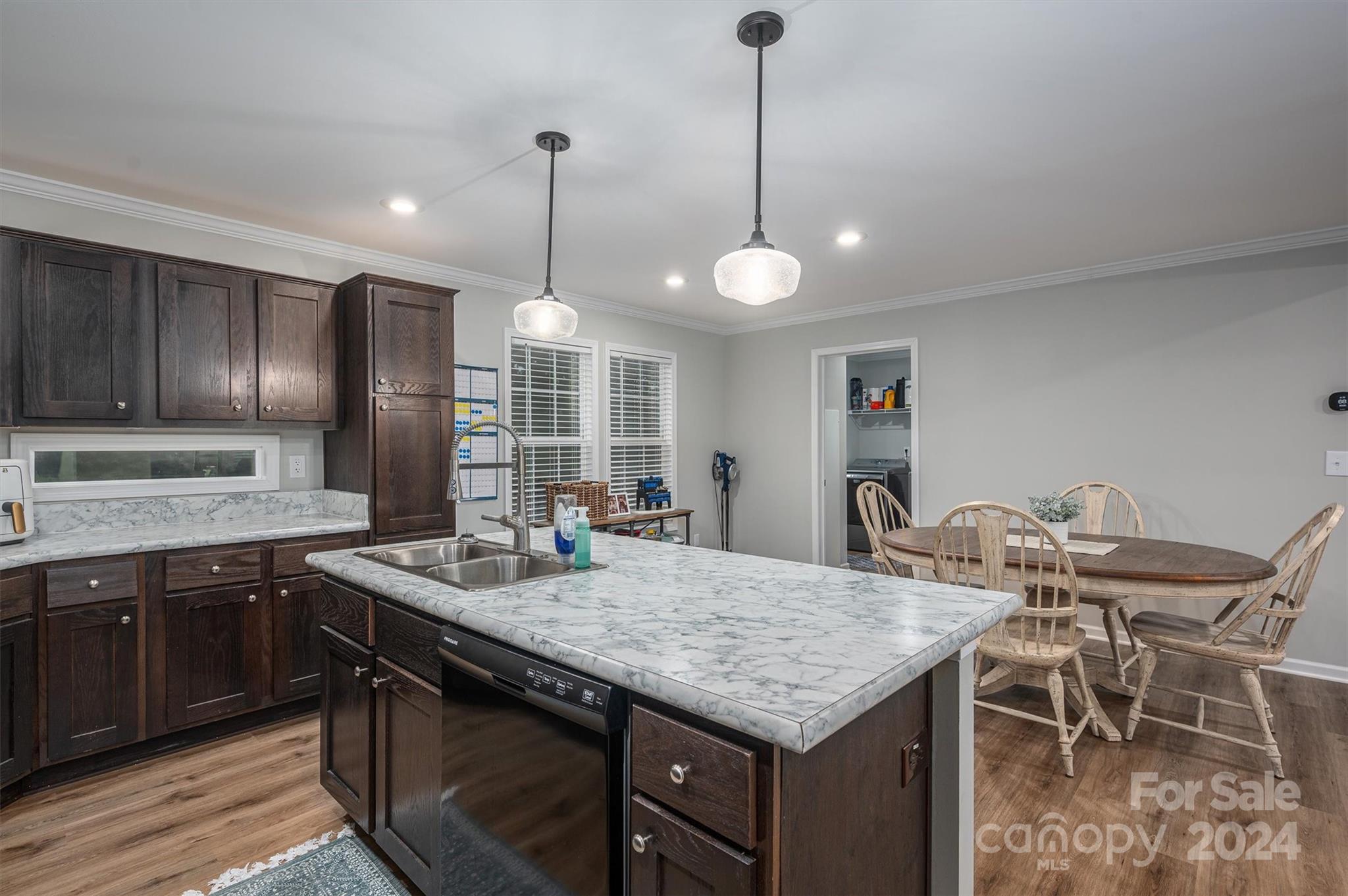 2388 Cat Square Road Vale, NC 28168 - Photo 17 of 33 a kitchen with granite countertop kitchen island stainless steel appliances a sink stove and cabinets